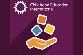 CE International white logo on a purple background with an icon of a hand holding colored blocks