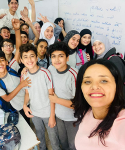 Photo of Yanal with her students