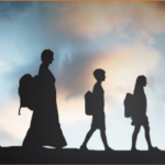 Image of three people walking with bags