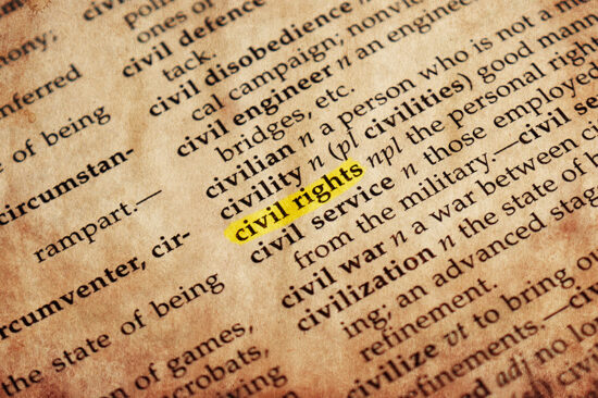 A page in a dictionary, which the entry of "civil rights" highlighted in yellow.