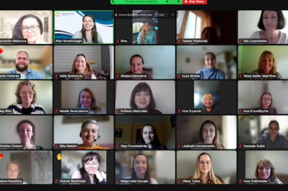 A screenshot of a Zoom meeting with many teachers from Ukraine and the U.S. taking part.