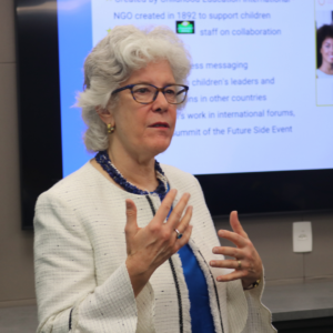 Dr. Sara Watson presenting about business partnerships.