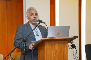 Sakil Malik speaking at the global seminar.