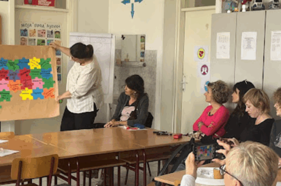 Teachers taking part in a conversation as part of a community of practice in a Serbian school.