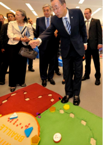 Former United Nations Secretary-General Bam Ki-Moon reviewing the Reach & Match prototype at a UN ECOSOC Innovation Fair. Source: UN Information Service 2011
